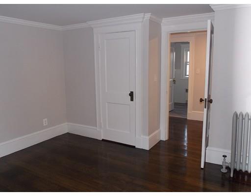 10 Fulton Street Woburn, MA 01801 - Photo 17 of 34 a view of a hallway with wooden floor