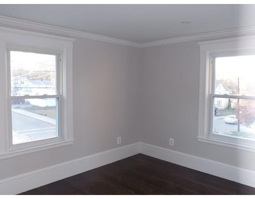 10 Fulton Street Woburn, MA 01801 - Photo 20 of 34 a view of an empty room with a window