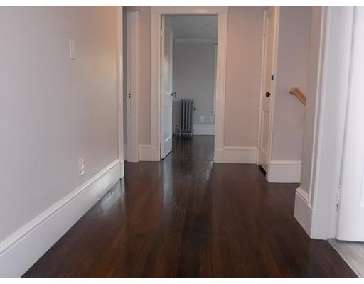 10 Fulton Street Woburn, MA 01801 - Photo 23 of 34 a view of a hallway with wooden floor