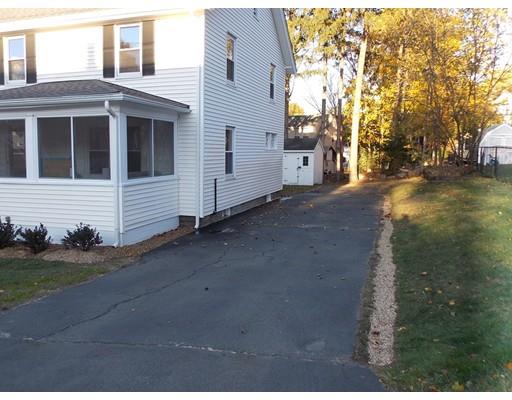 10 Fulton Street Woburn, MA 01801 - Photo 3 of 34 a view of a house with a yard