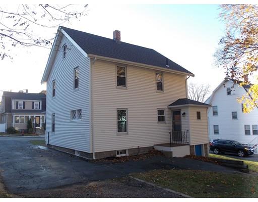 10 Fulton Street Woburn, MA 01801 - Photo 31 of 34 a front view of a house with a yard