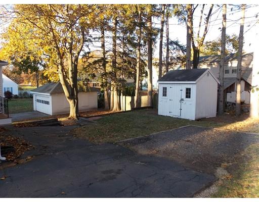 10 Fulton Street Woburn, MA 01801 - Photo 32 of 34 a front view of a house with a yard
