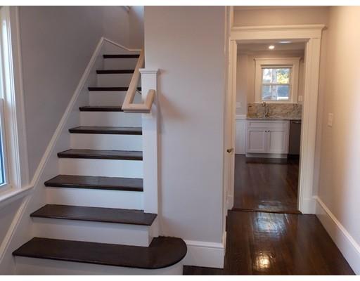 10 Fulton Street Woburn, MA 01801 - Photo 4 of 34 a view of entryway and hall with wooden floor