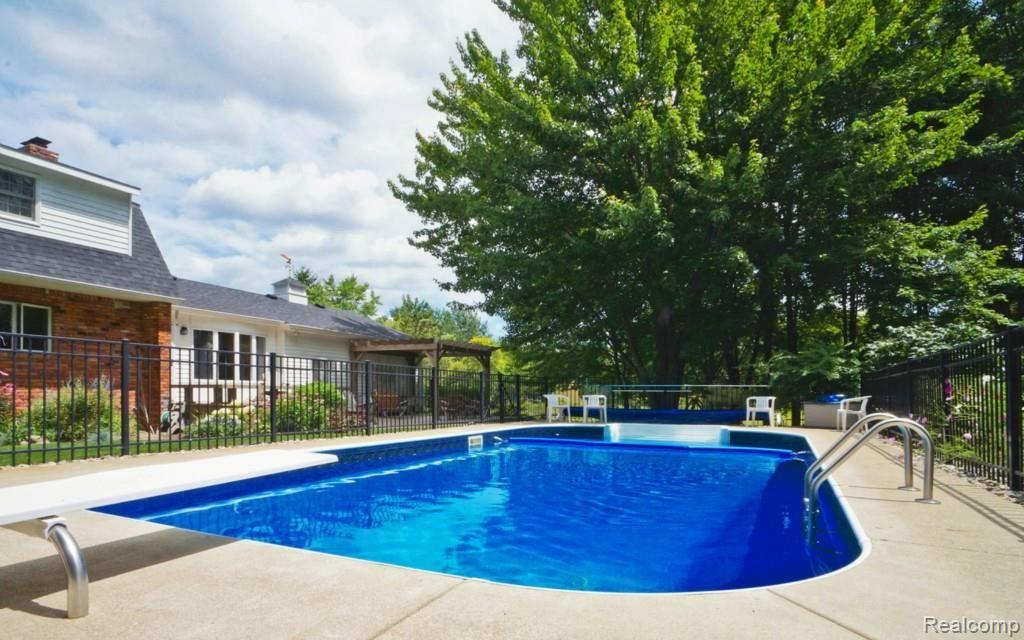 6174 Hardy Lane Howell, MI 48855 - Photo 22 of 25 Gorgeous pool!