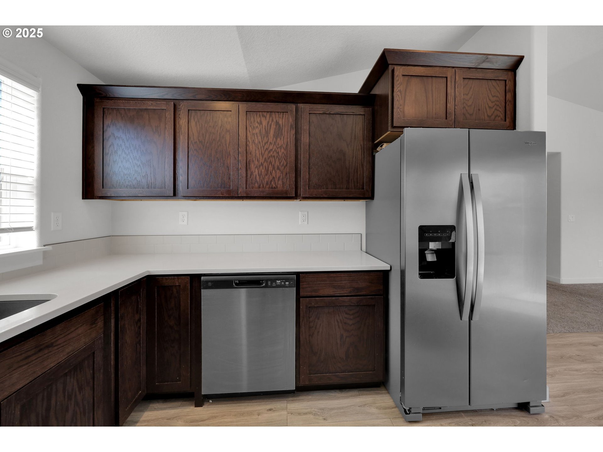 463 35th Street Springfield, OR 97478 - Photo 16 of 41 a kitchen with a refrigerator cabinet and a sink