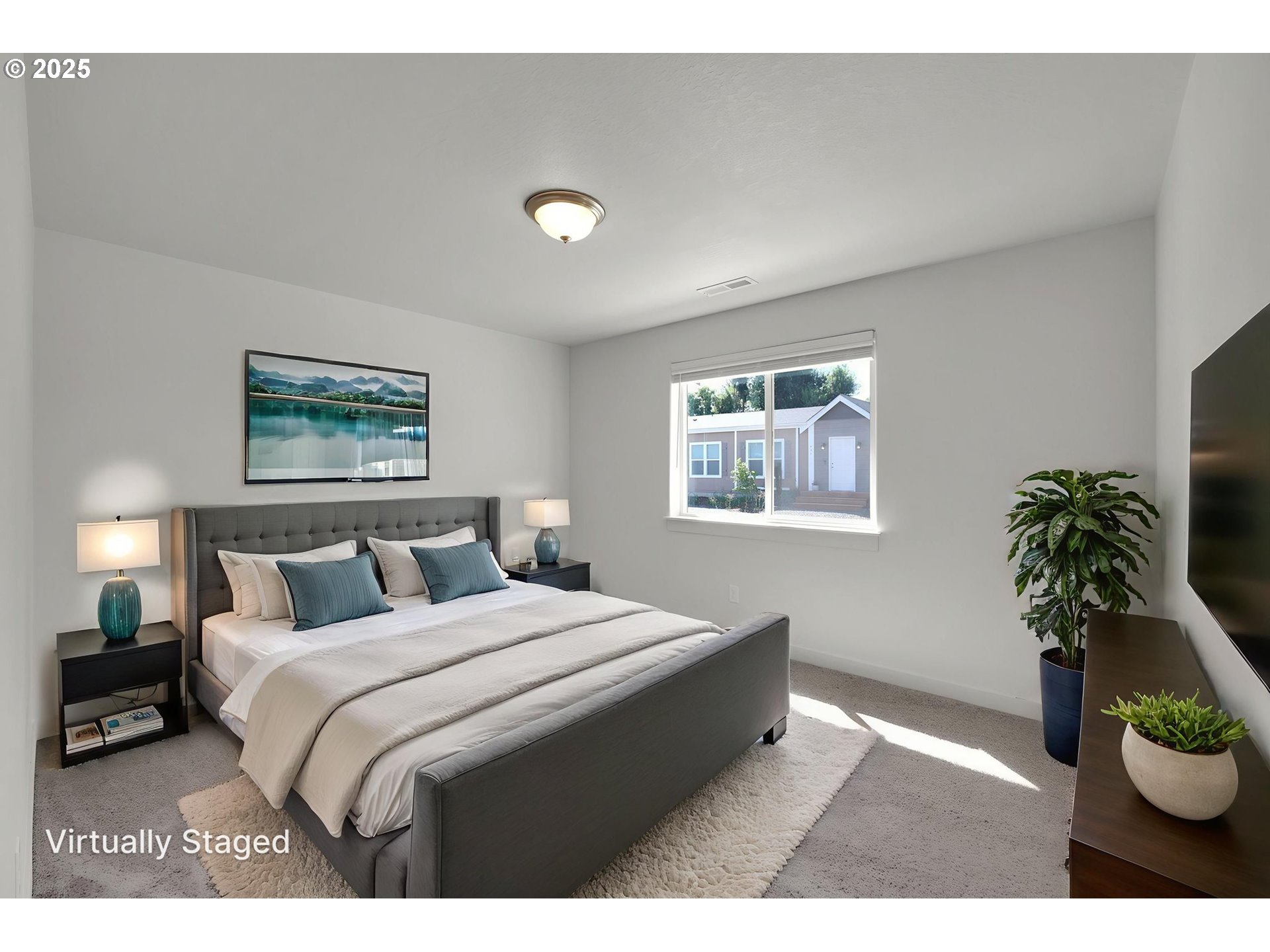 463 35th Street Springfield, OR 97478 - Photo 21 of 41 a bedroom with a bed and a potted plant