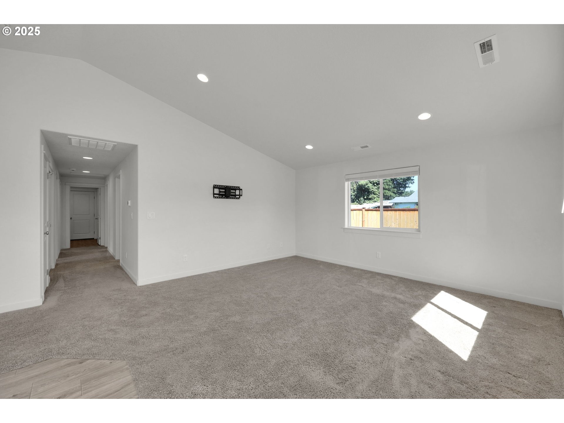 463 35th Street Springfield, OR 97478 - Photo 6 of 41 a view of an empty room with a window