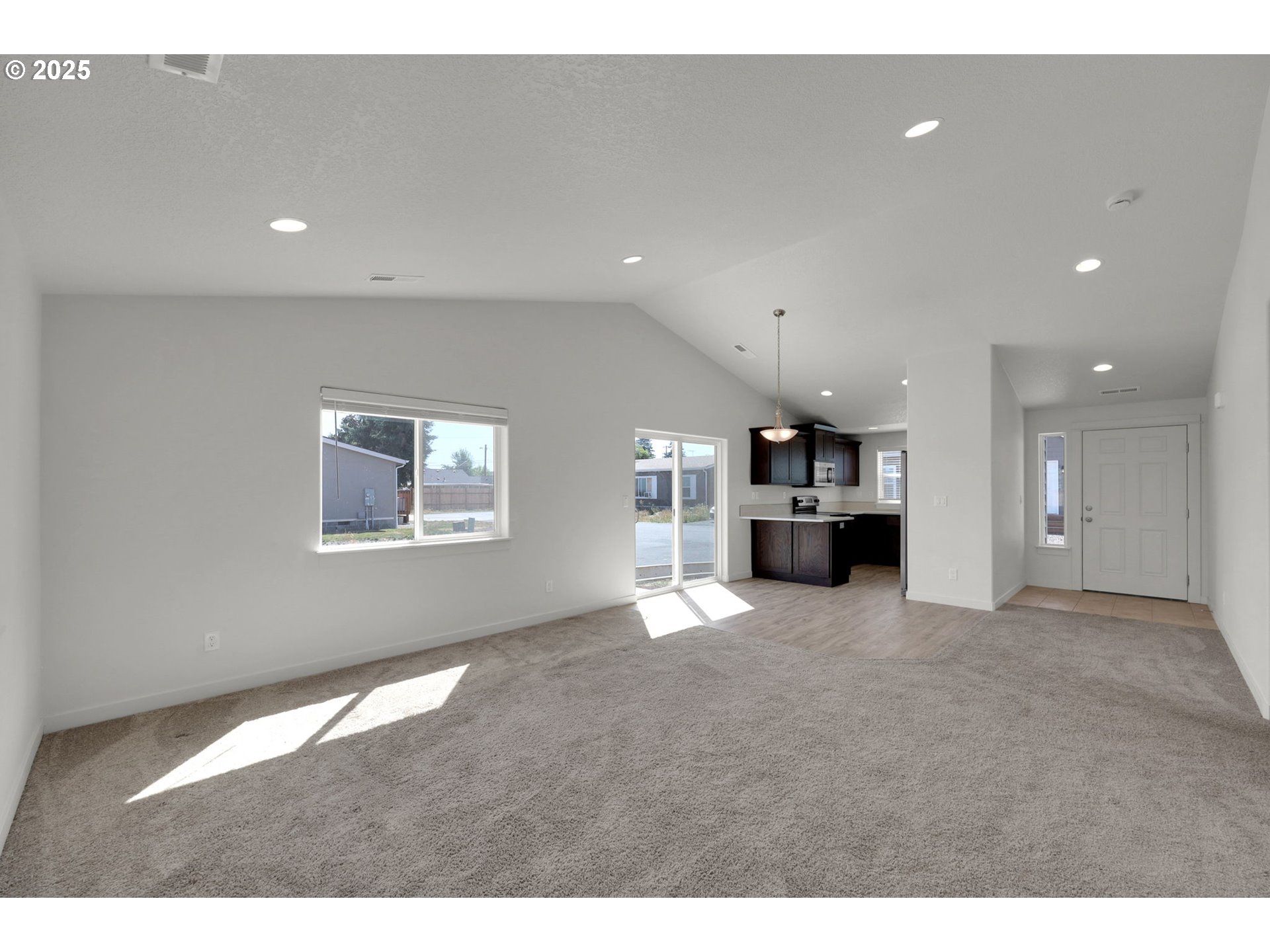 463 35th Street Springfield, OR 97478 - Photo 8 of 41 a view of empty room with kitchen