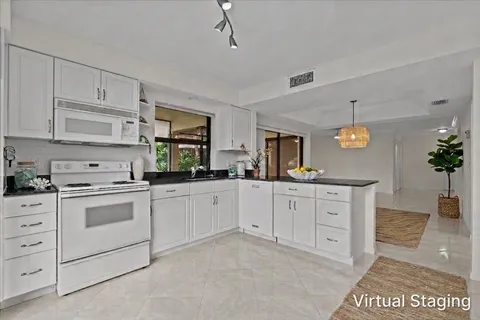 $489,000 | 17138 Waterbend Drive, Unit 117, Jupiter, FL 33477