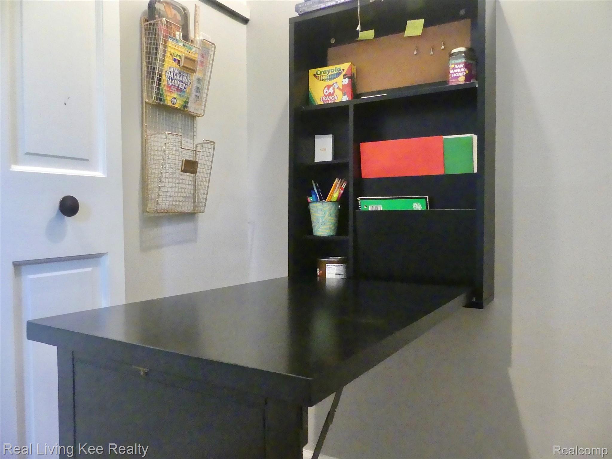 350 Beechview Drive Rochester, MI 48306 - Photo 44 of 54 Foldable student desk built into closet in family room