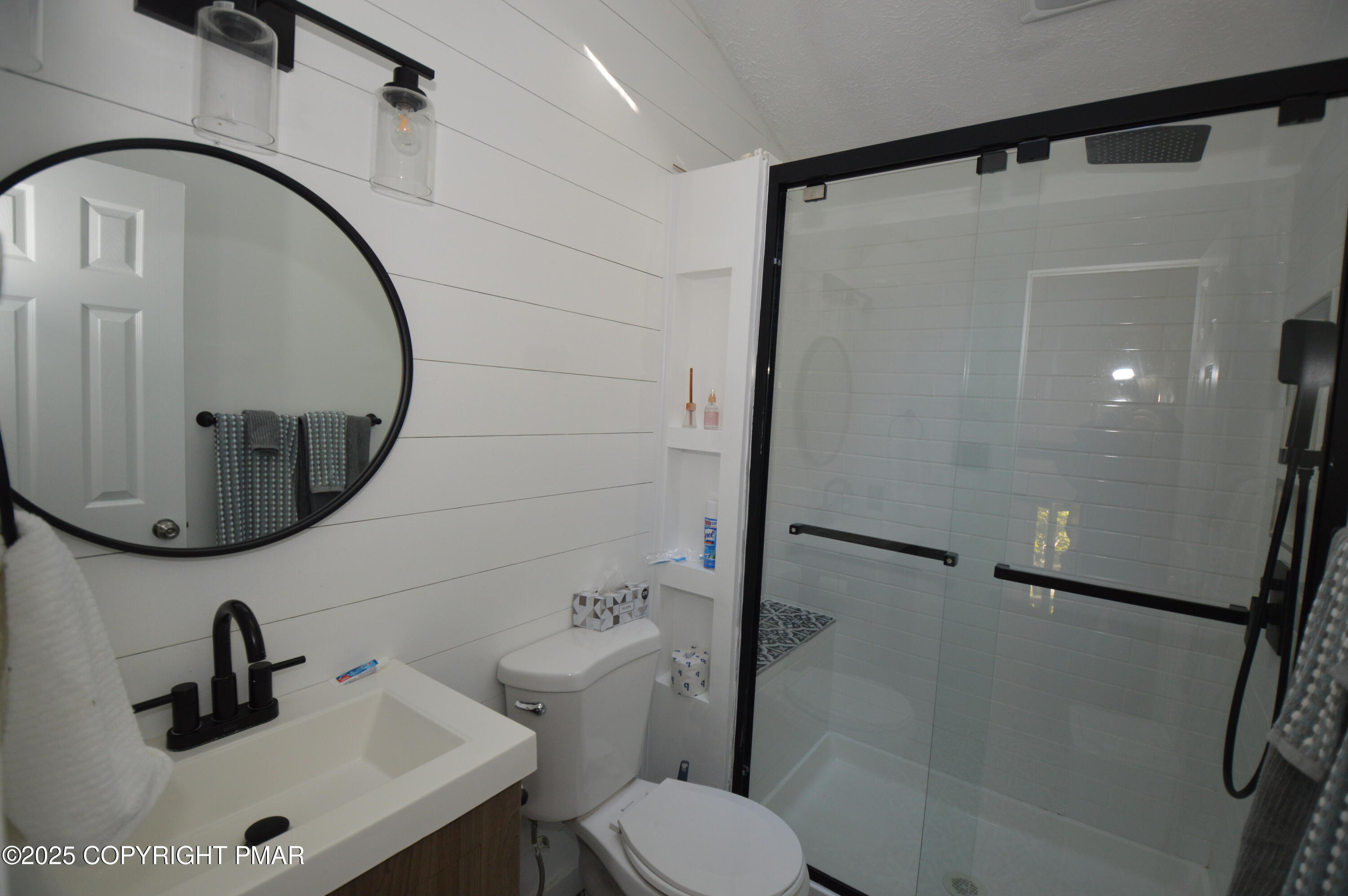 128 Ashley Court Bushkill, PA 18324 - Photo 15 of 43 a bathroom with a sink toilet and a mirror