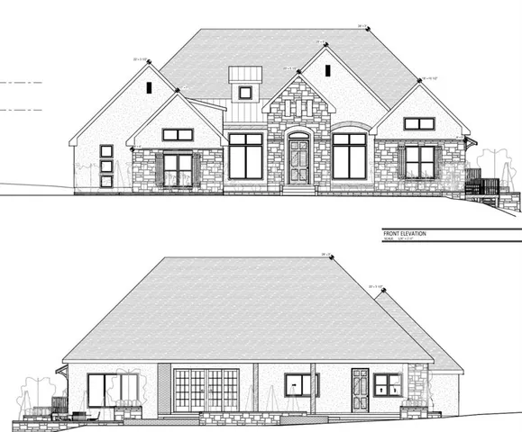 a view of a white house next to a large building