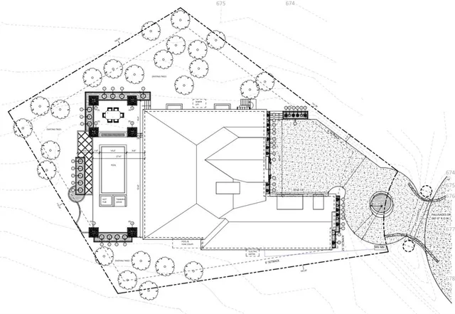 a view of a swimming pool with a big yard and a large trees