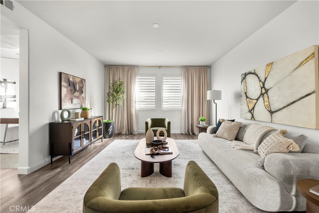 22157 Barrington Way Saugus, CA 91350 - Photo 11 of 46 a living room with furniture or couch and a window