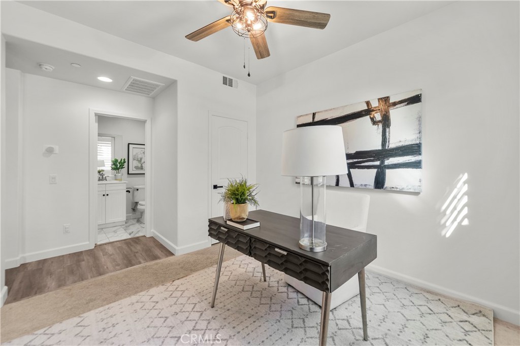22157 Barrington Way Saugus, CA 91350 - Photo 15 of 46 a living room with furniture and a wooden floor