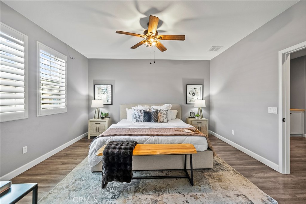 22157 Barrington Way Saugus, CA 91350 - Photo 25 of 46 a bedroom with a bed and window