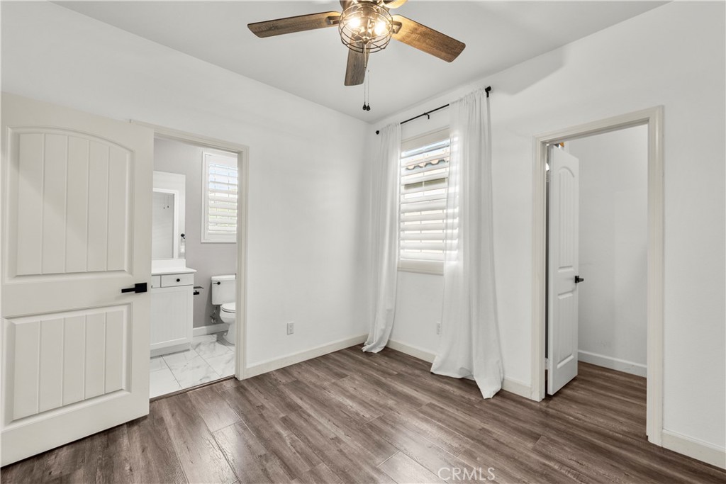 22157 Barrington Way Saugus, CA 91350 - Photo 32 of 46 wooden floor in an empty room with a window