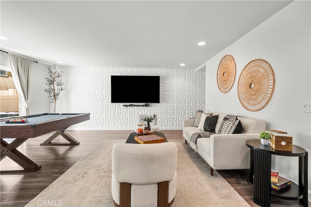 22157 Barrington Way Saugus, CA 91350 - Photo 5 of 46 a living room with furniture and a flat screen tv