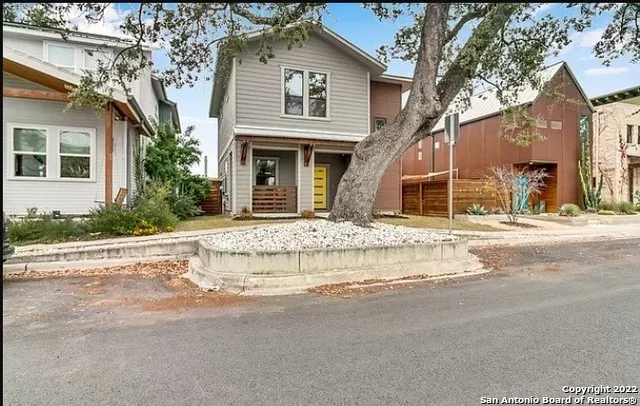 front view of a house with a street