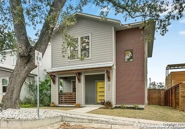 a front view of a house with a outdoor space
