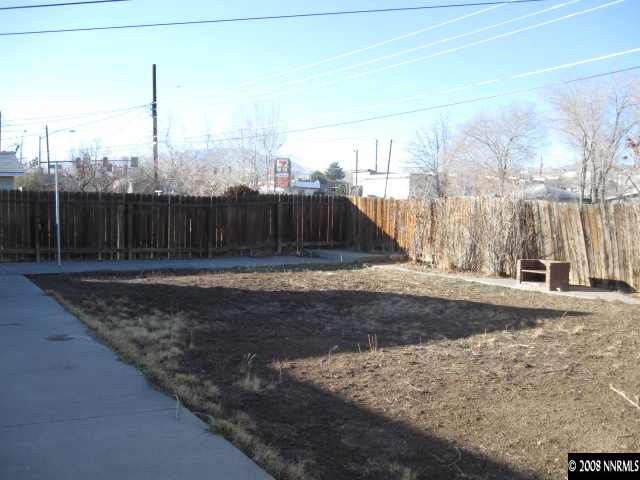 1285 Trainer Way Reno, NV 89512 - Photo 8 of 9 a view of a road with a fence