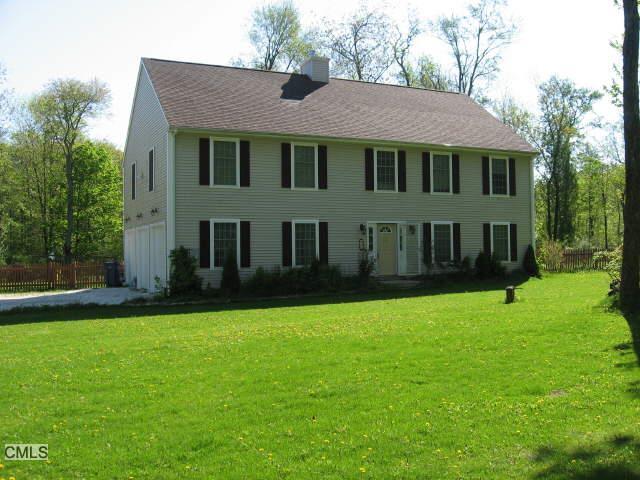 36 Partridge Road Warren, CT 06754 - Photo 1 of 1 a front view of a house with a yard