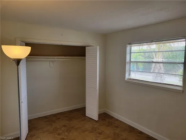 a view of a room that has a window in it