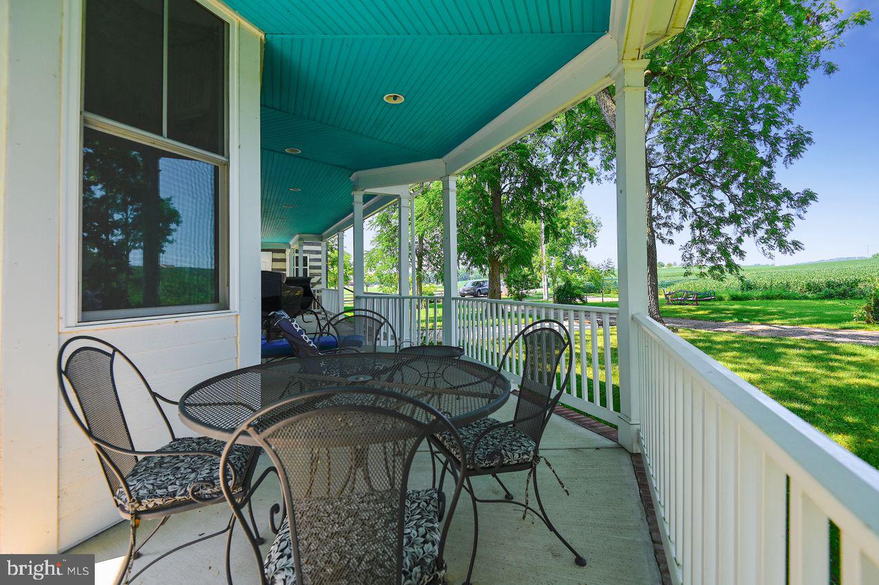 1705 Bachmans Valley Road Westminster, MD 21157 - Photo 24 of 26 Sweeping front porch with view of farm and valley