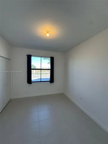 a bathroom with a sink a toilet and a bathtub