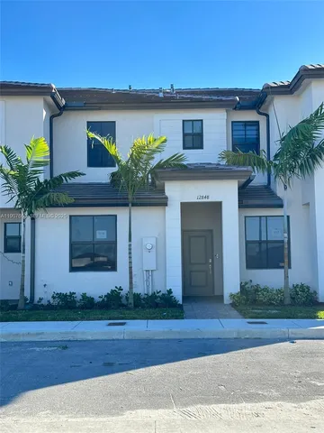 front view of a house with a street