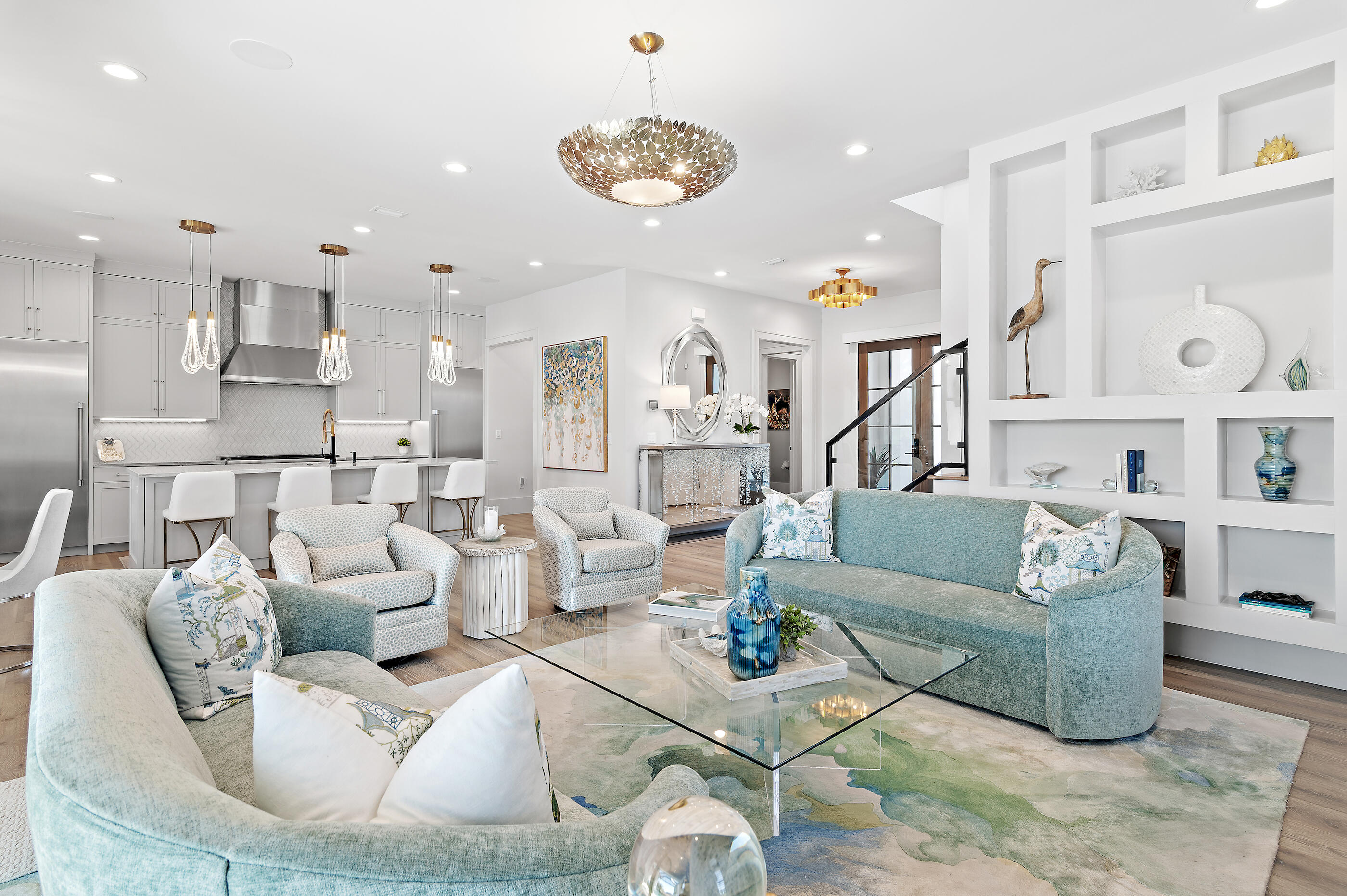 4572 Sailmaker Lane Destin, FL 32541 - Photo 14 of 49 a living room with furniture kitchen view and a chandelier