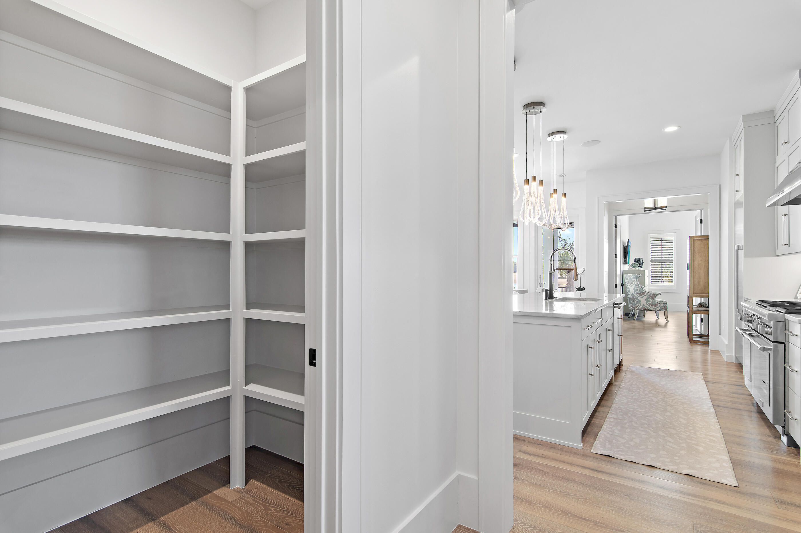 4572 Sailmaker Lane Destin, FL 32541 - Photo 18 of 49 a view of a living room with furniture and wooden floor