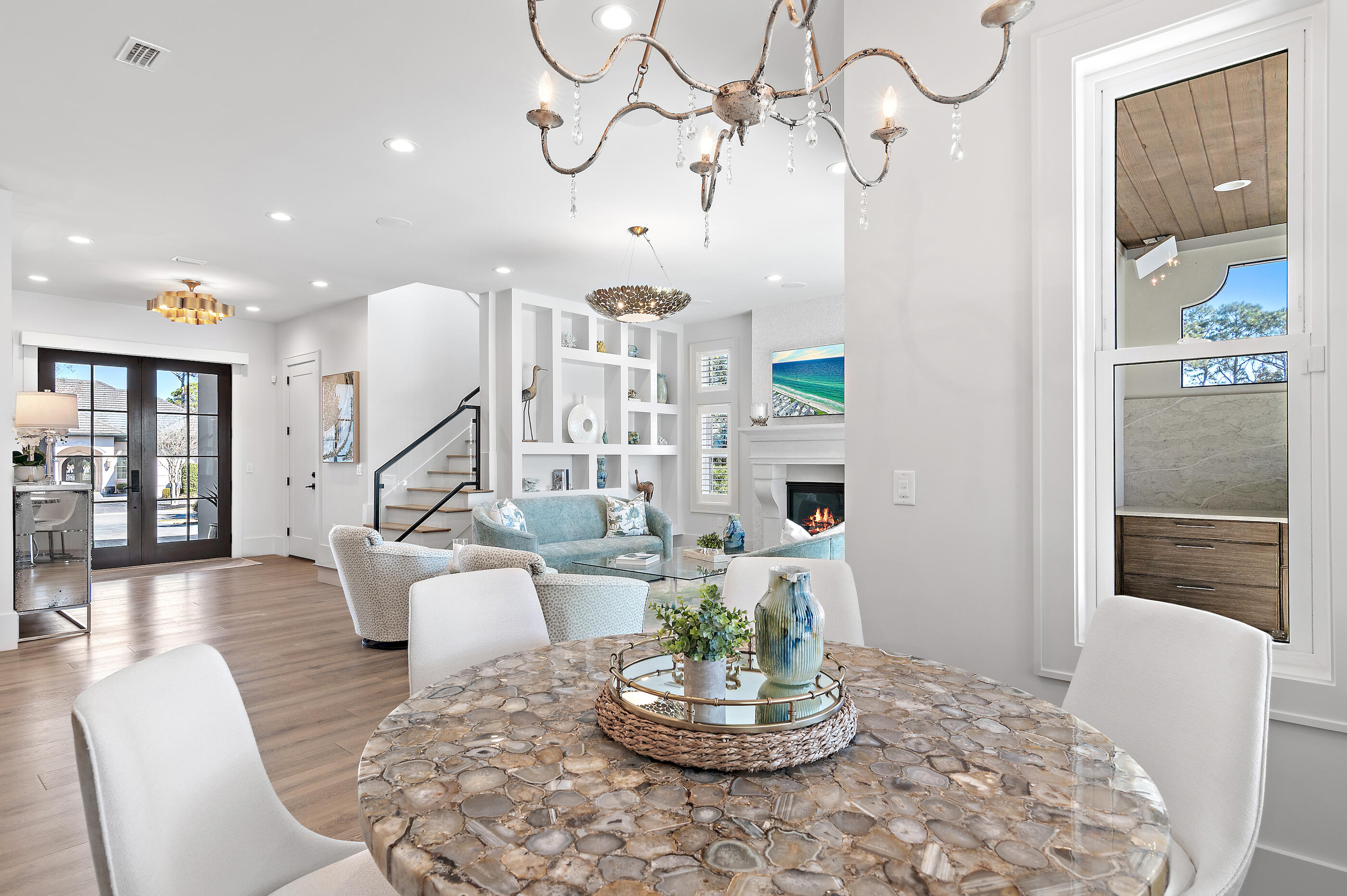 4572 Sailmaker Lane Destin, FL 32541 - Photo 20 of 49 a living room with furniture and a chandelier