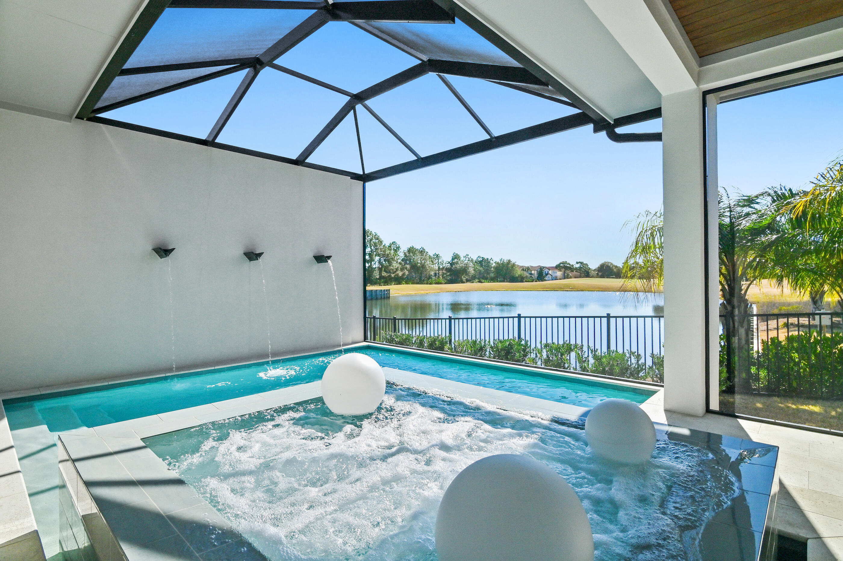 4572 Sailmaker Lane Destin, FL 32541 - Photo 24 of 49 a view of a wooden floor and a table in the patio