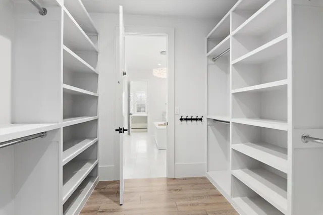 a view of an empty walk in closet