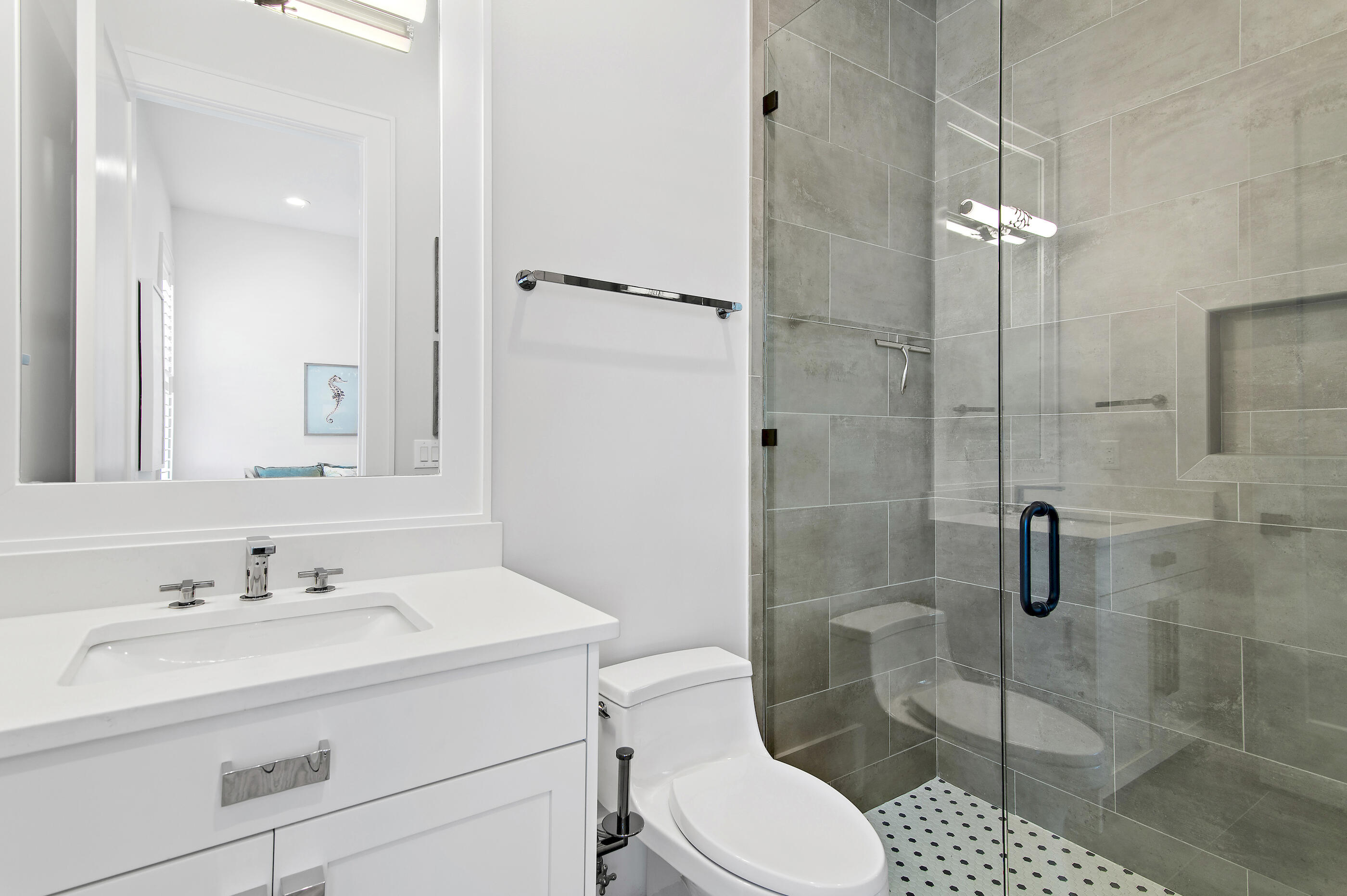 4572 Sailmaker Lane Destin, FL 32541 - Photo 35 of 49 a bathroom with a sink a toilet and shower