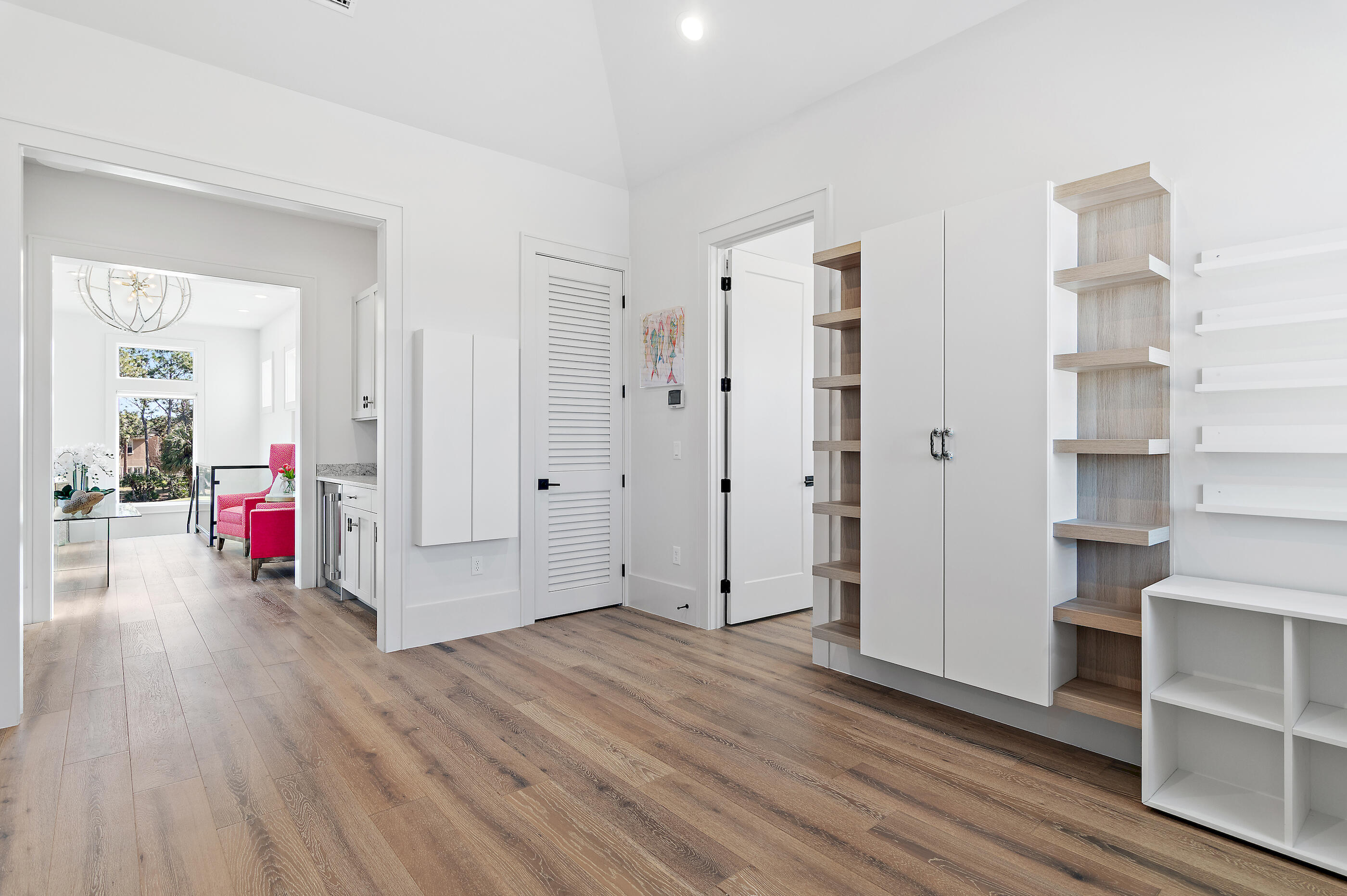 4572 Sailmaker Lane Destin, FL 32541 - Photo 39 of 49 a view of a livingroom with wooden floor and furniture