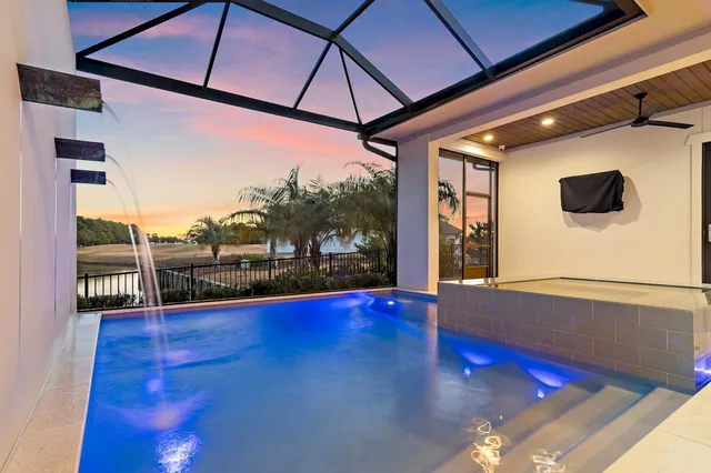 a view of a living room with a large window