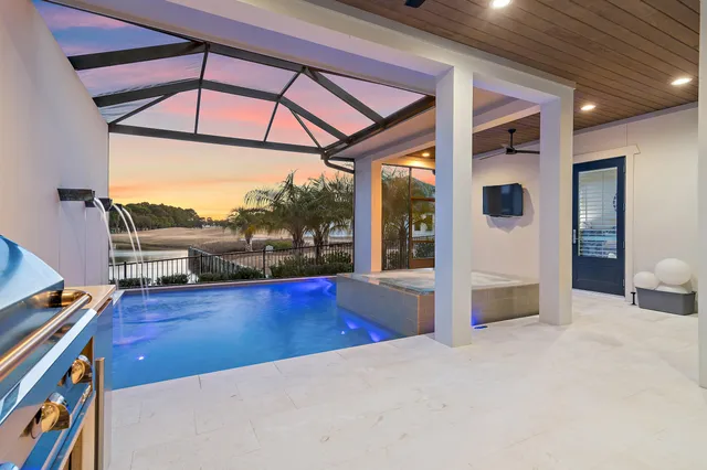 a view of a living room and a flat screen tv