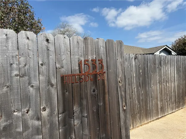 a view of a row of large trees