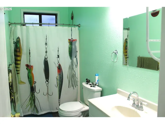 a backyard of a house with barbeque oven