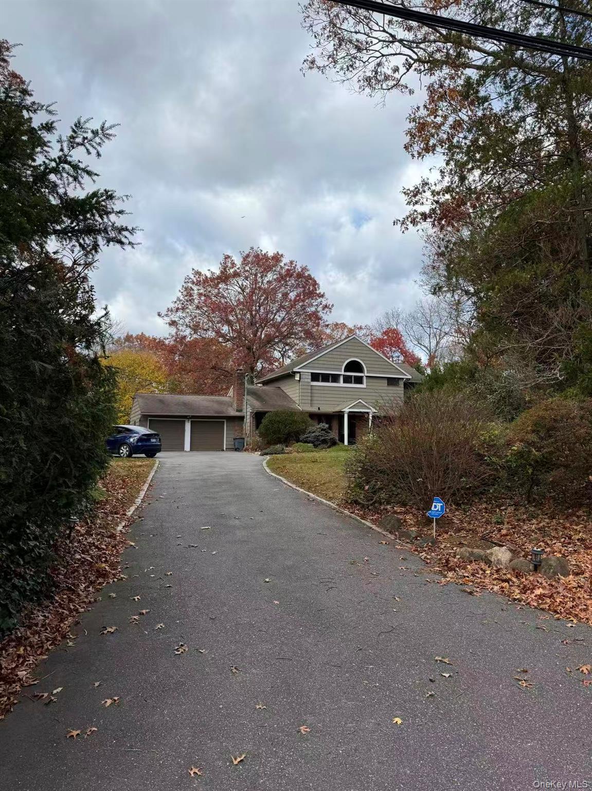 4 Norgate Road Glen Head, NY 11545 - Photo 2 of 25 a front view of house with yard