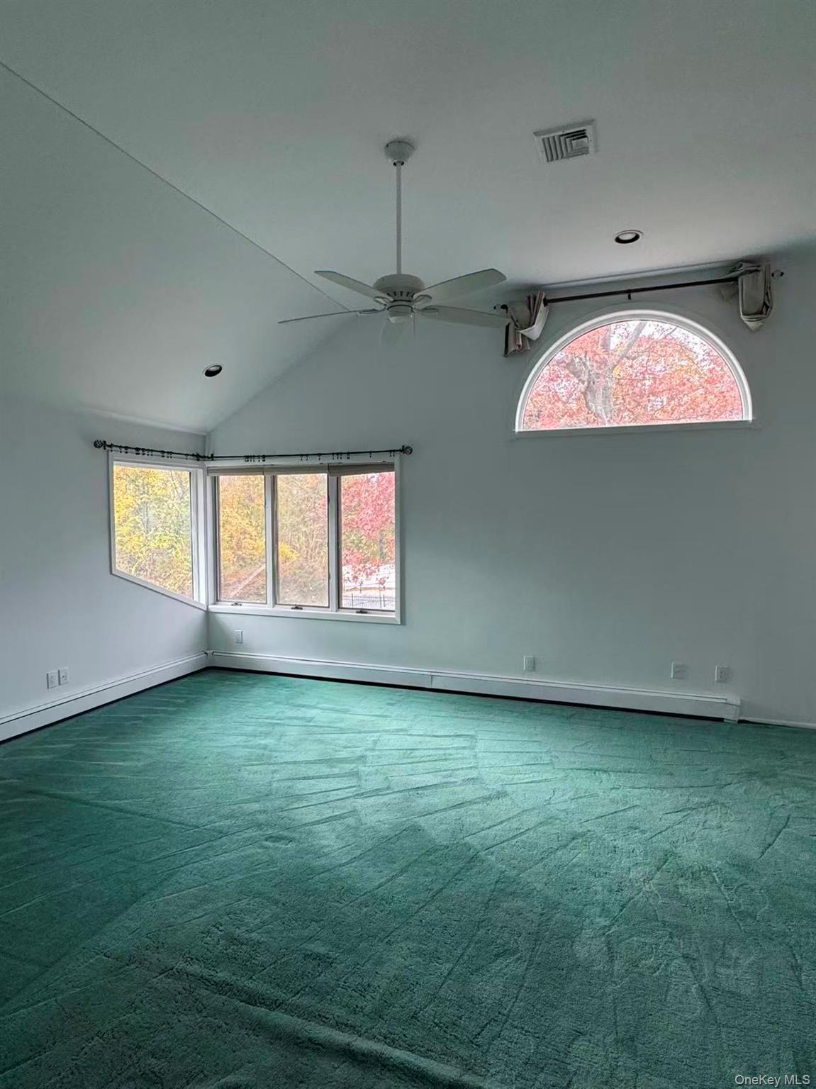 4 Norgate Road Glen Head, NY 11545 - Photo 21 of 25 an empty room with a window and fireplace
