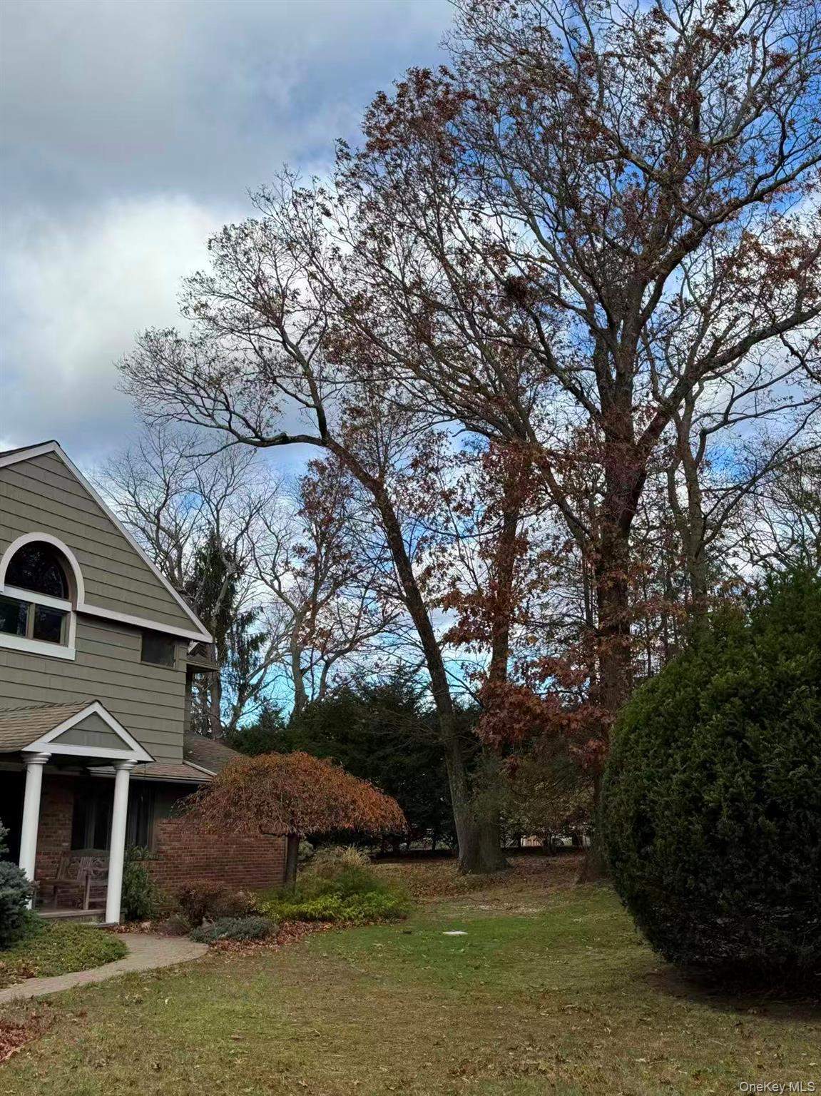4 Norgate Road Glen Head, NY 11545 - Photo 5 of 25 a front view of house with yard and green space