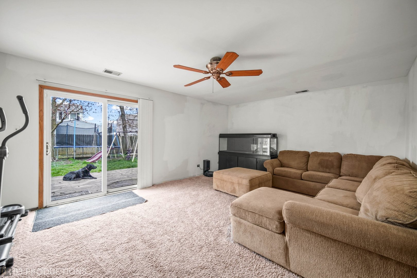 20656 South Acorn Ridge Drive Frankfort, IL 60423 - Photo 9 of 19 a living room with furniture a flat screen tv and a large window