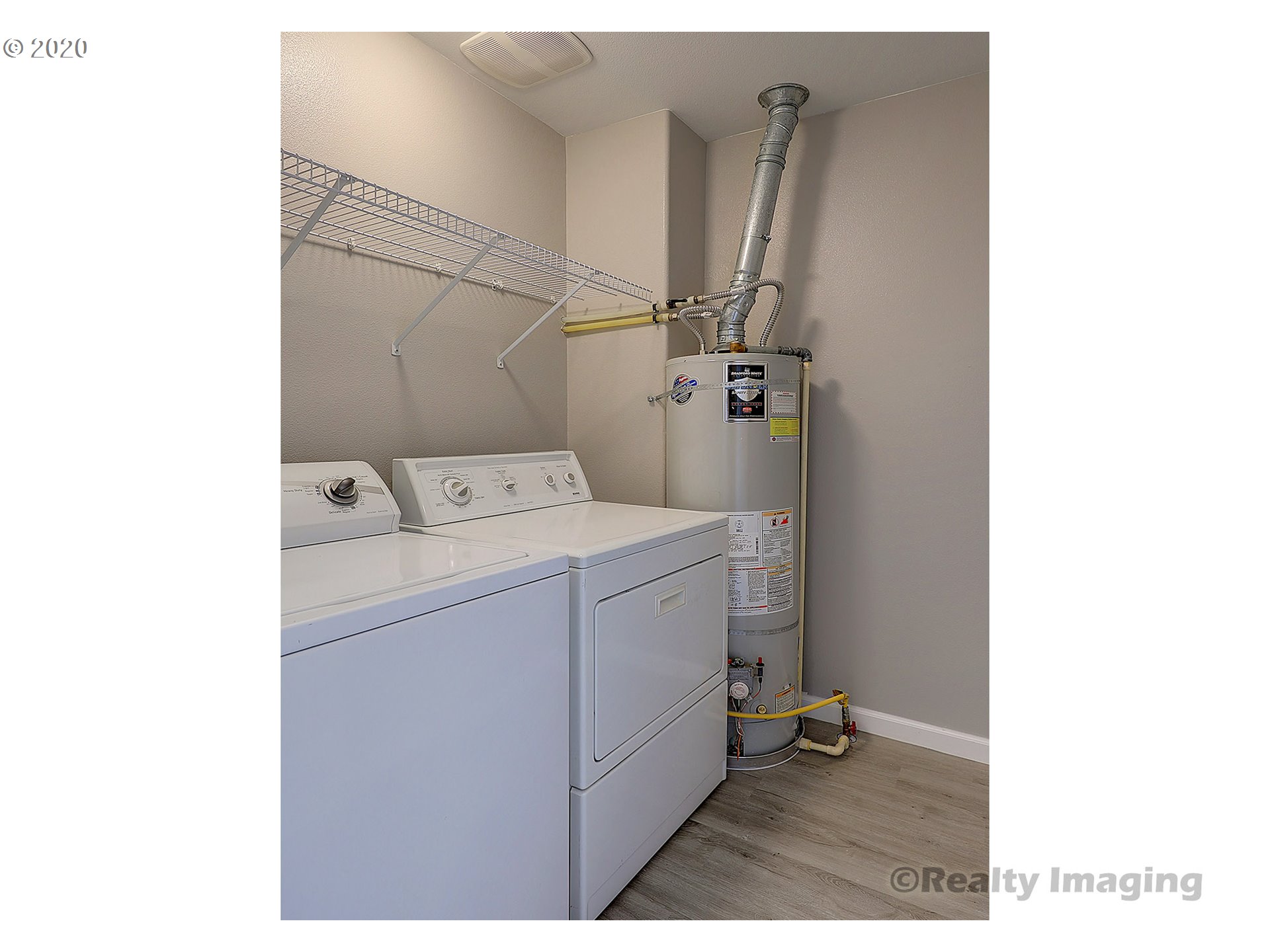 14805 Southwest Sandhill Loop, Unit 203 Beaverton, OR 97007 - Photo 11 of 20 a utility room with dryer and washer
