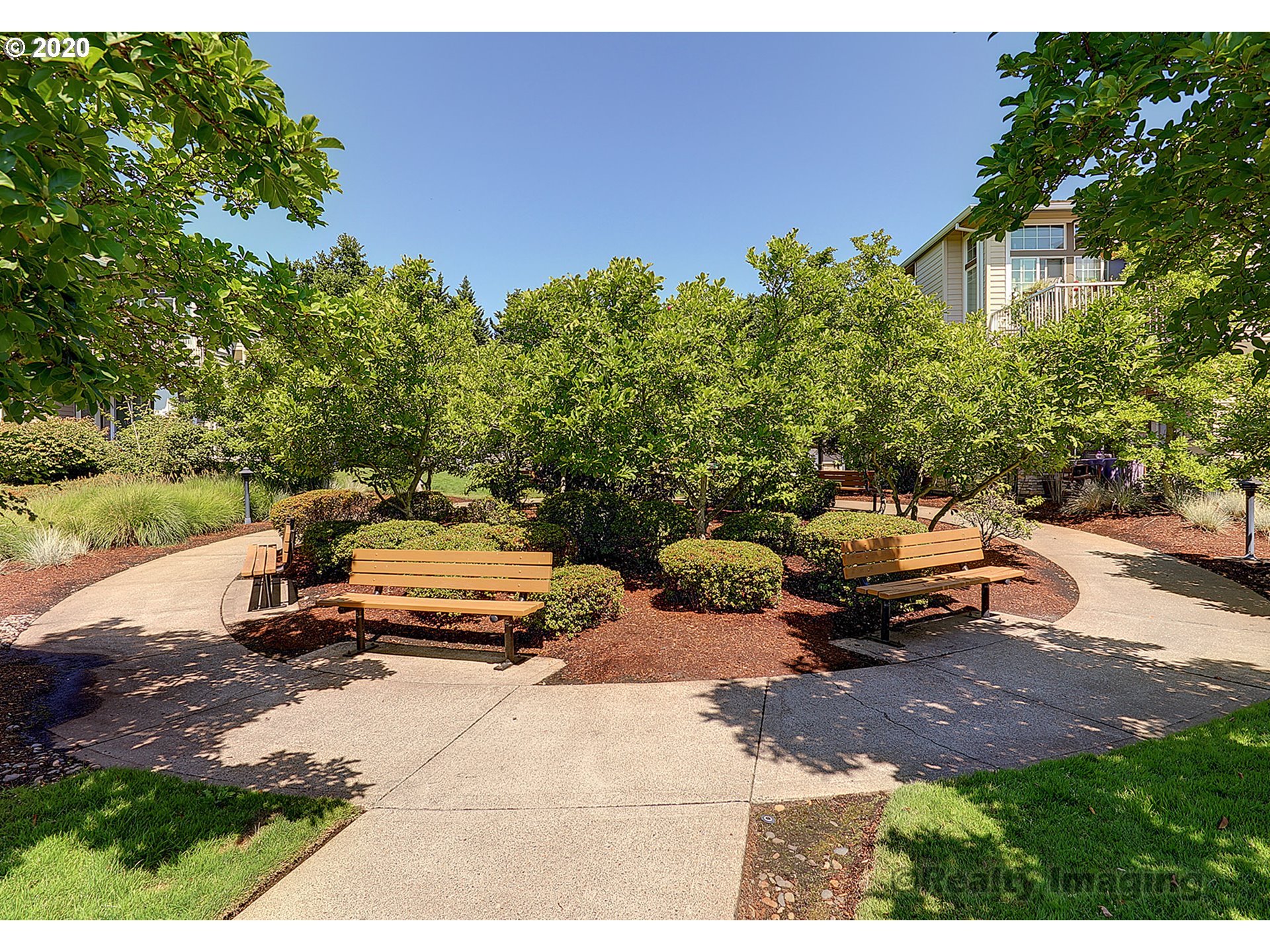 14805 Southwest Sandhill Loop, Unit 203 Beaverton, OR 97007 - Photo 13 of 20 a view of a backyard with couches and a fire pit