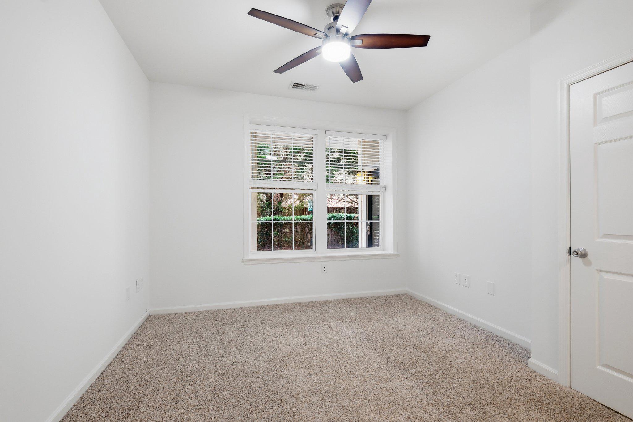 31 Booth Street, Unit B55 Gaithersburg, MD 20878 - Photo 12 of 30 an empty room with a window and a fan