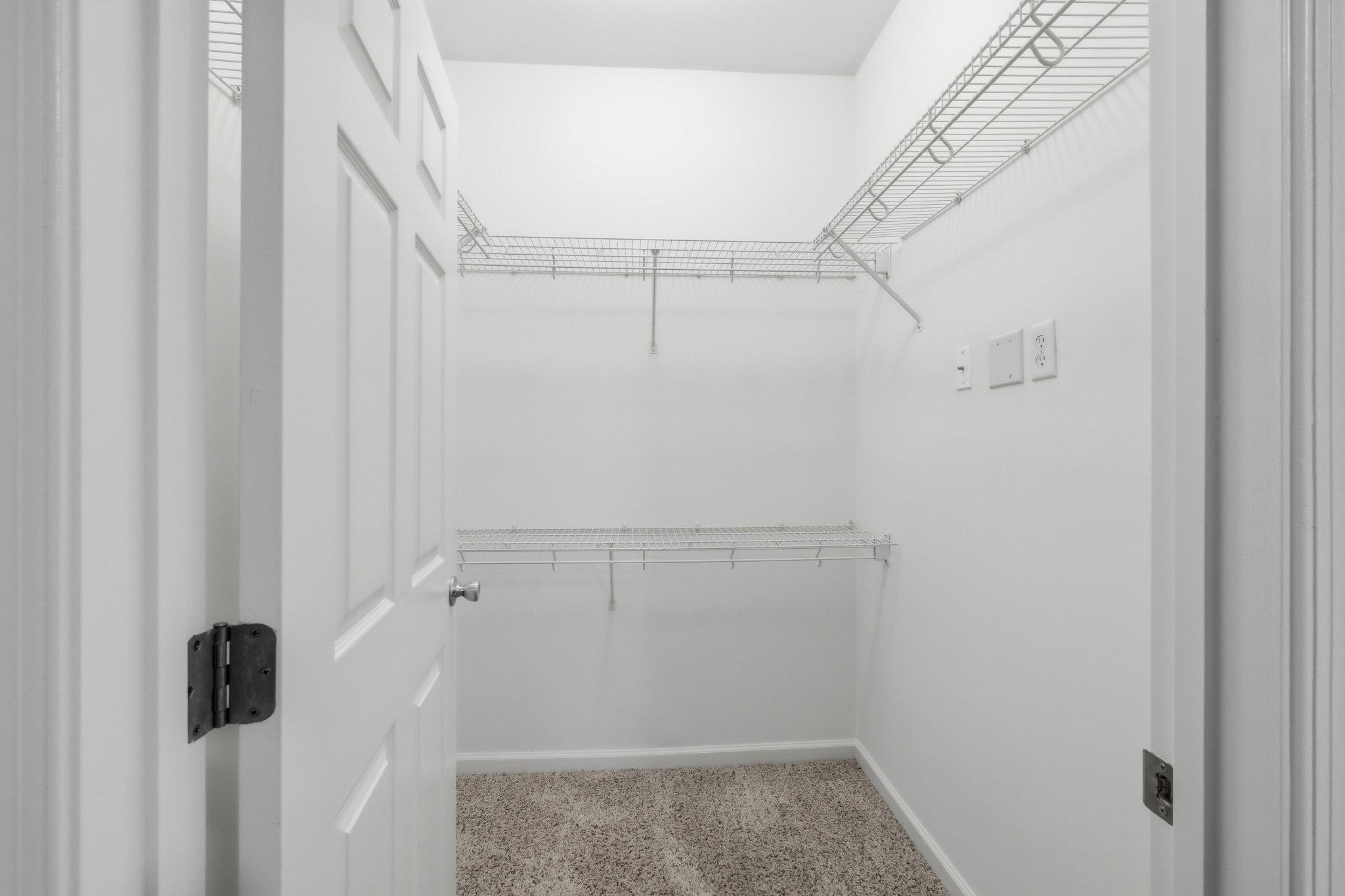 31 Booth Street, Unit B55 Gaithersburg, MD 20878 - Photo 14 of 30 a view of a room with racks on the wall