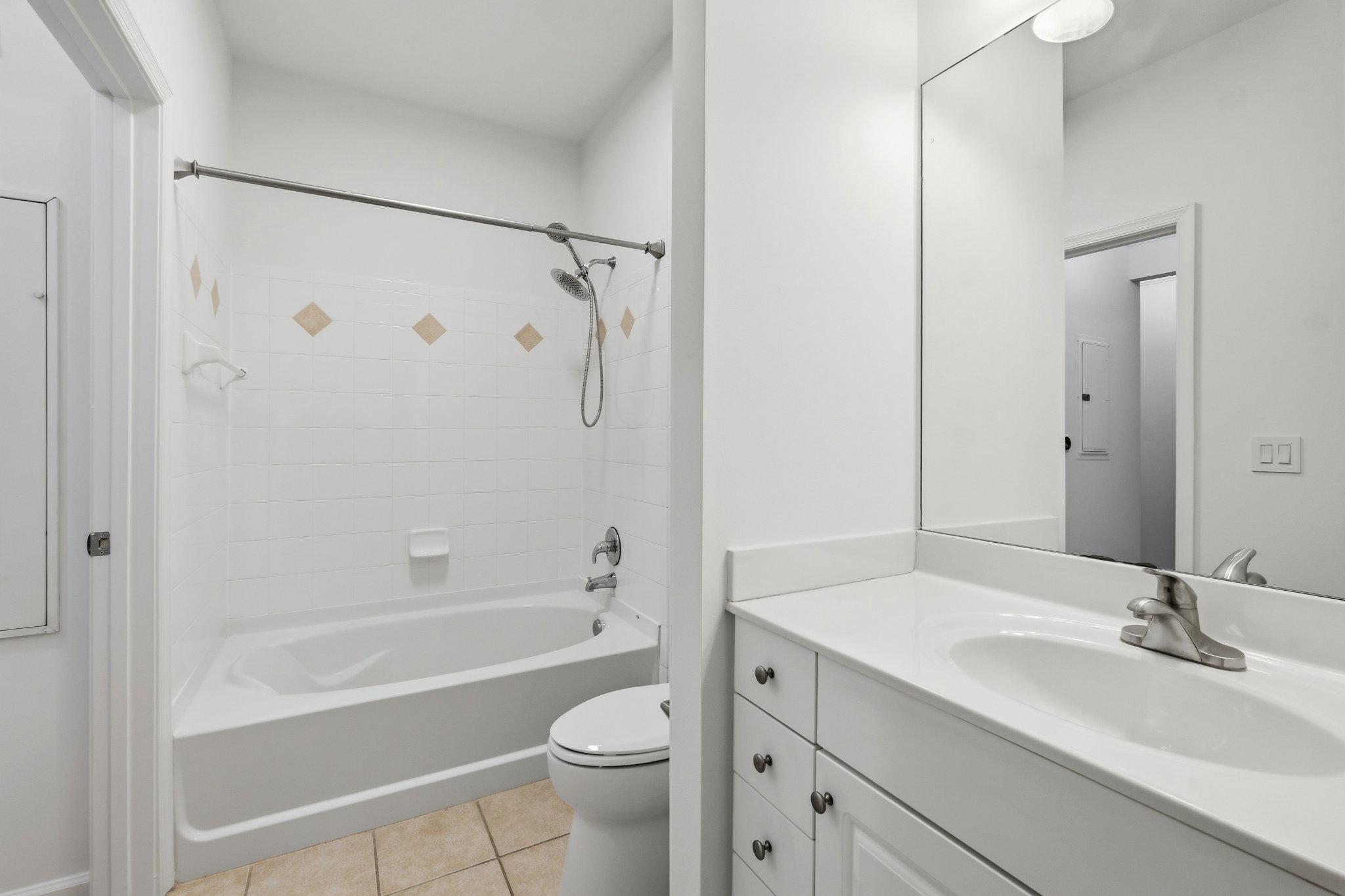 31 Booth Street, Unit B55 Gaithersburg, MD 20878 - Photo 15 of 30 a bathroom with a sink toilet and shower